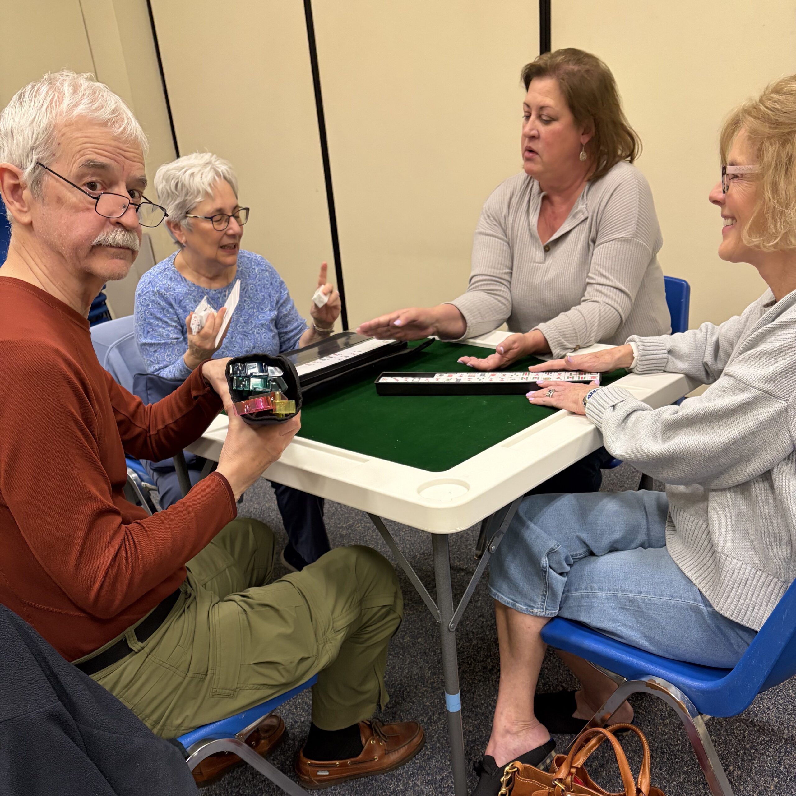 I am volunteering to teach mah jongg at the Norwalk Library. Even the men are joining.